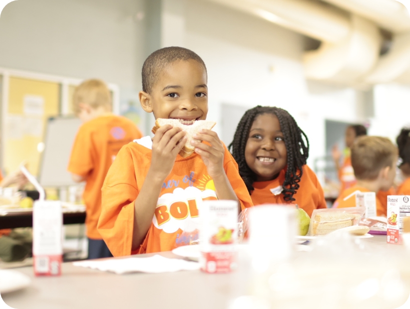 boy and girl at lunch table